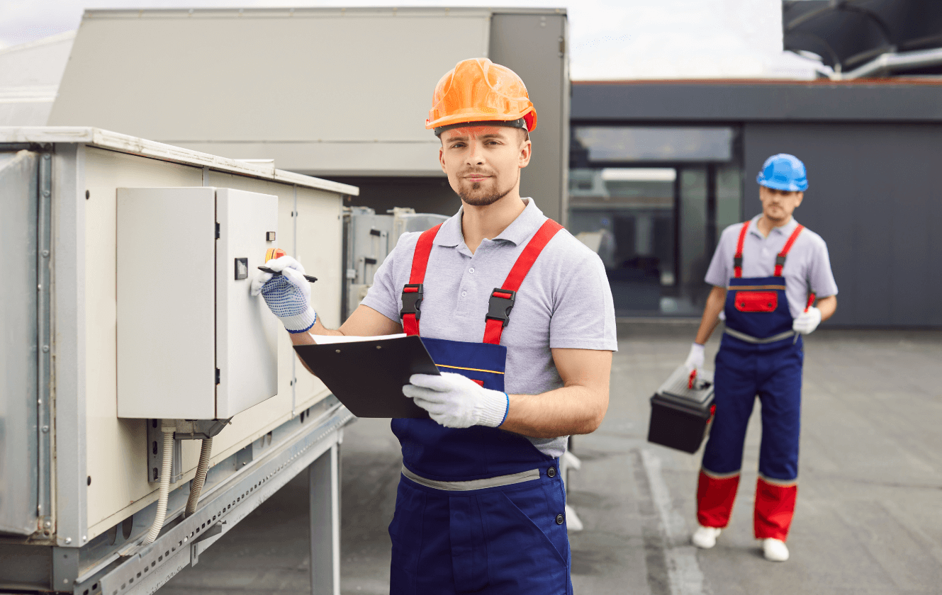 Industrial HVAC cooling system servicing and maintenance in large warehouse facility Dubai industrial zone Al Quoz