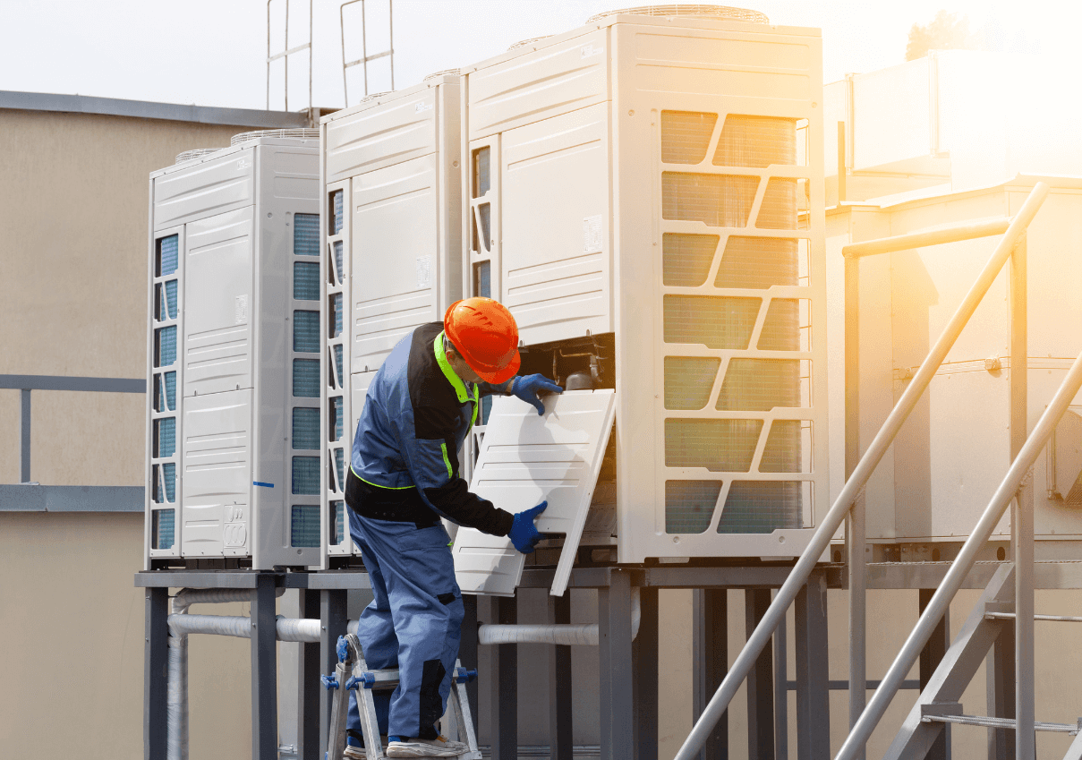 HVAC maintenance engineer servicing commercial air conditioning system in Dubai