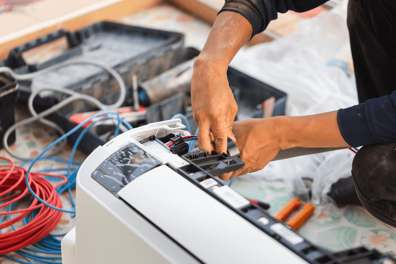 Split AC unit repair servicing and maintenance by RSK Technical certified technician in Dubai commercial premises UAE