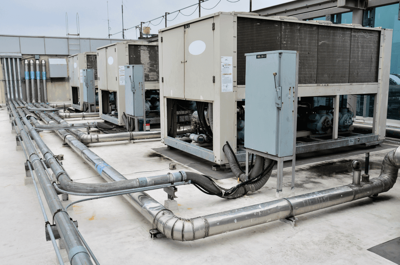 Commercial chiller system repair and air conditioning maintenance service for large building Dubai industrial UAE